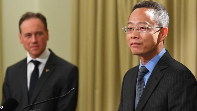 Victoria and Tasmania Consul-General of China Long Zhou (right) and Health Minister Greg Hunt during a press conference. Picture: AAP/James Ross