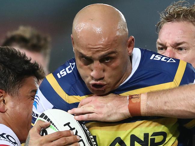 SYDNEY, AUSTRALIA - MARCH 29:  Blake Ferguson of the Eels is tackled during the round three NRL match between the Parramatta Eels and the Sydney Roosters at ANZ Stadium on March 29, 2019 in Sydney, Australia. (Photo by Mark Metcalfe/Getty Images)