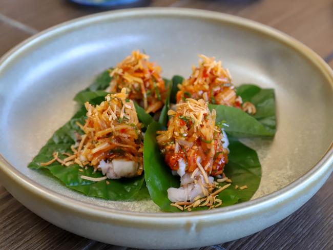 Moreton Bay bug betel leaf with peanuts, chilli, lime and toasted coconut. Picture: Jenifer Jagielski