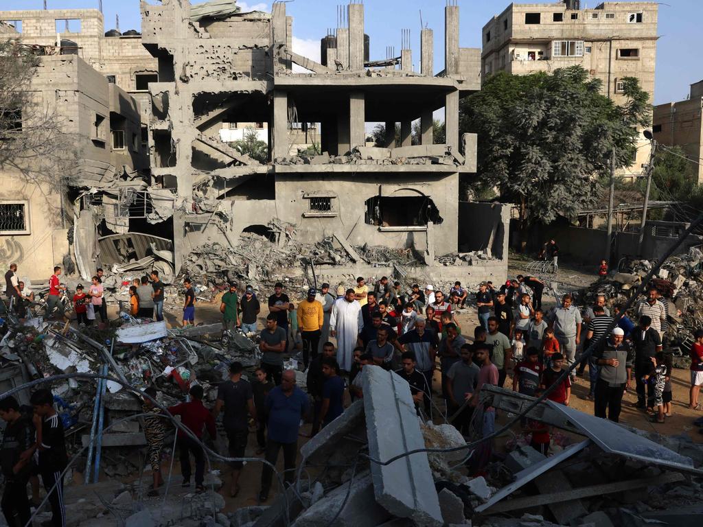 Palestinians inspect the damage after overnight Israeli strikes on Rafah in the southern Gaza Strip. Picture: AFP