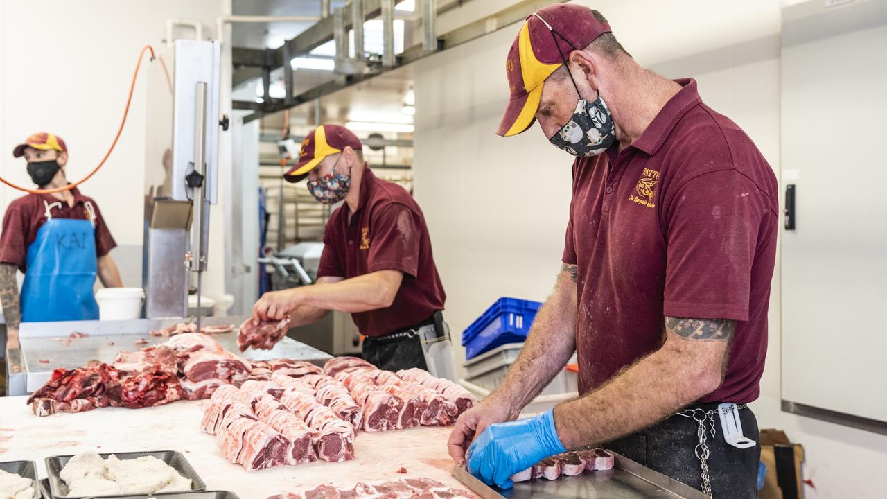 Patton's co-manager Jason Patton (right) as the butcher at the Hooper Centre has plenty of supply and is swamped by customers, Thursday, January 6, 2022. Picture: Kevin Farmer