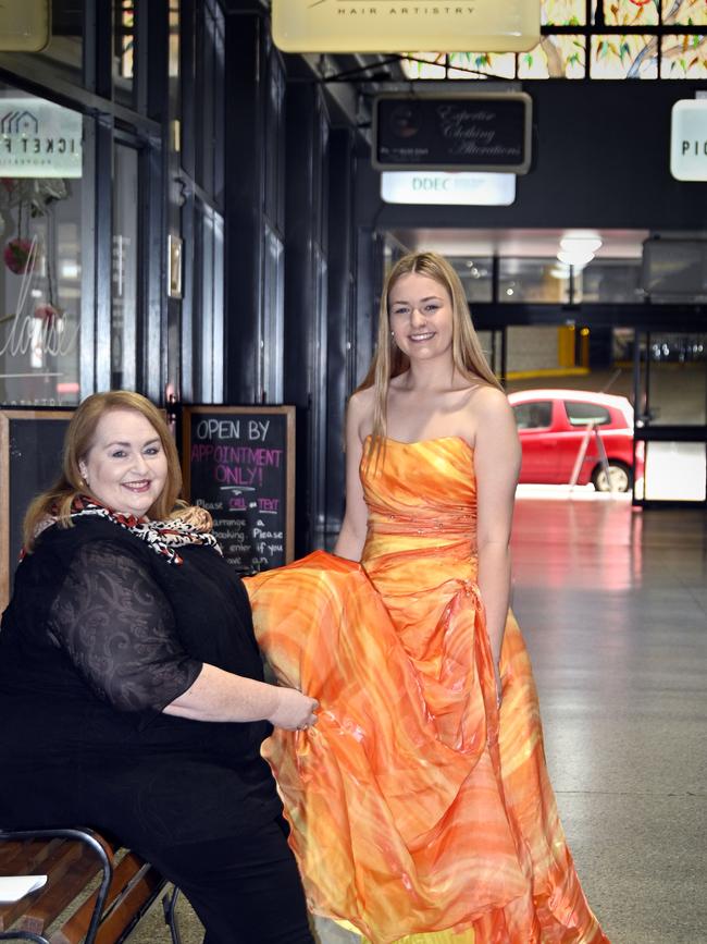 Project manager Kim Stokes with Jorja Facer modelling dresses for Project School Formal. The Formal Project is up and running for 2020 with hundreds of gowns and suits ready to be given away to graduating seniors.