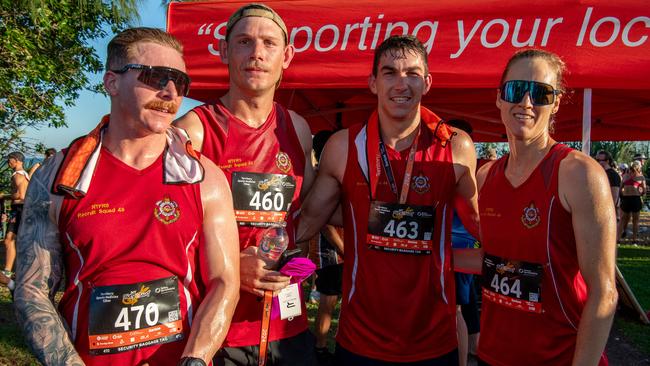 Four NTFRS squad members post race. Picture: Pema Tamang Pakhrin.