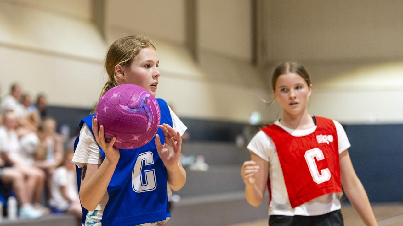 Milla Fitzpatrick (left) during Toowoomba Netball Association junior representative trials at Clive Berghofer Arena, St Mary's College, Sunday, October 23, 2022. Picture: Kevin Farmer