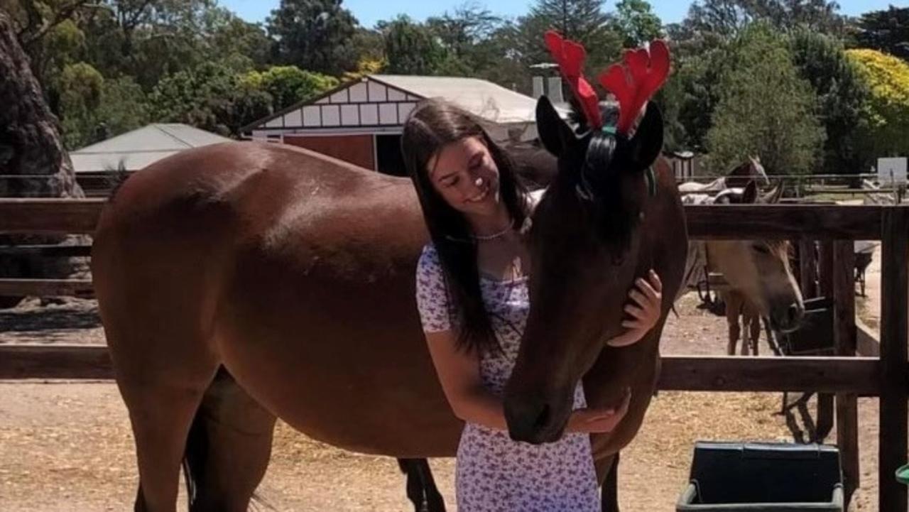 Amy with her cherished horse Elliot just days before she died. Picture: Supplied