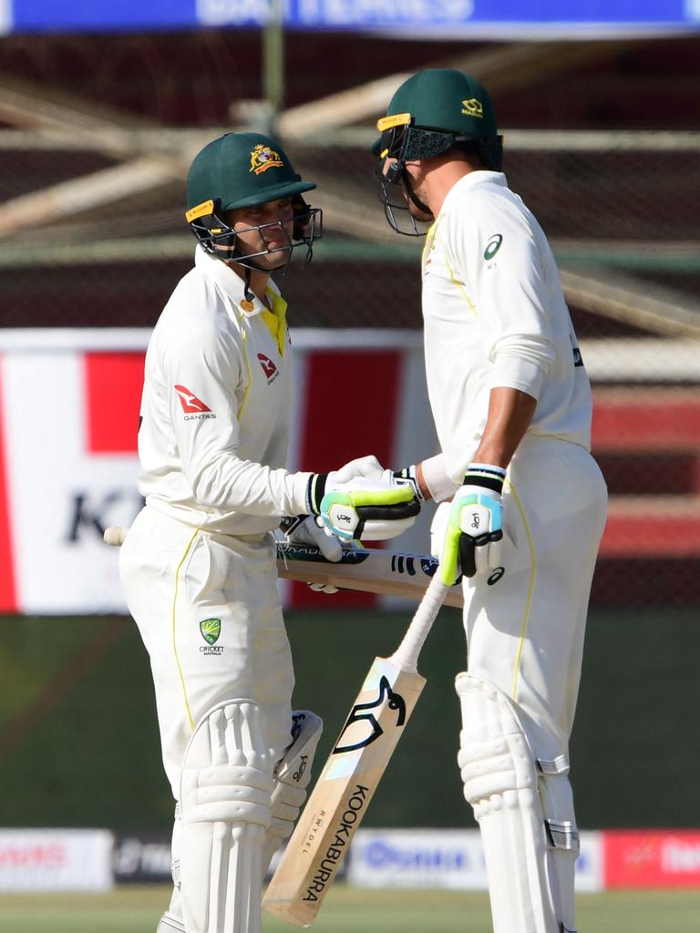 Alex Carey celebrates after scoring a half-century. Photo by ASIF HASSAN / AFP.