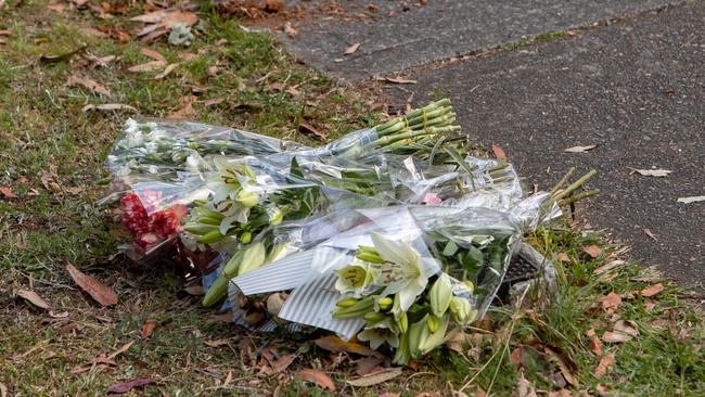 Flowers left at the scene. Picture: Julian Andrews