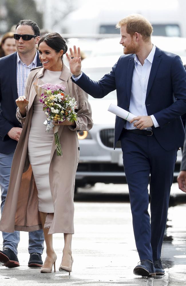 Back in Auckland, the royals dried up and ditched the casual attire for a visit to Pillars, a charity operating that supports children who have a parent in prison. and to meet members of the public during a walkabout. Picture: Chris Jackson/AP