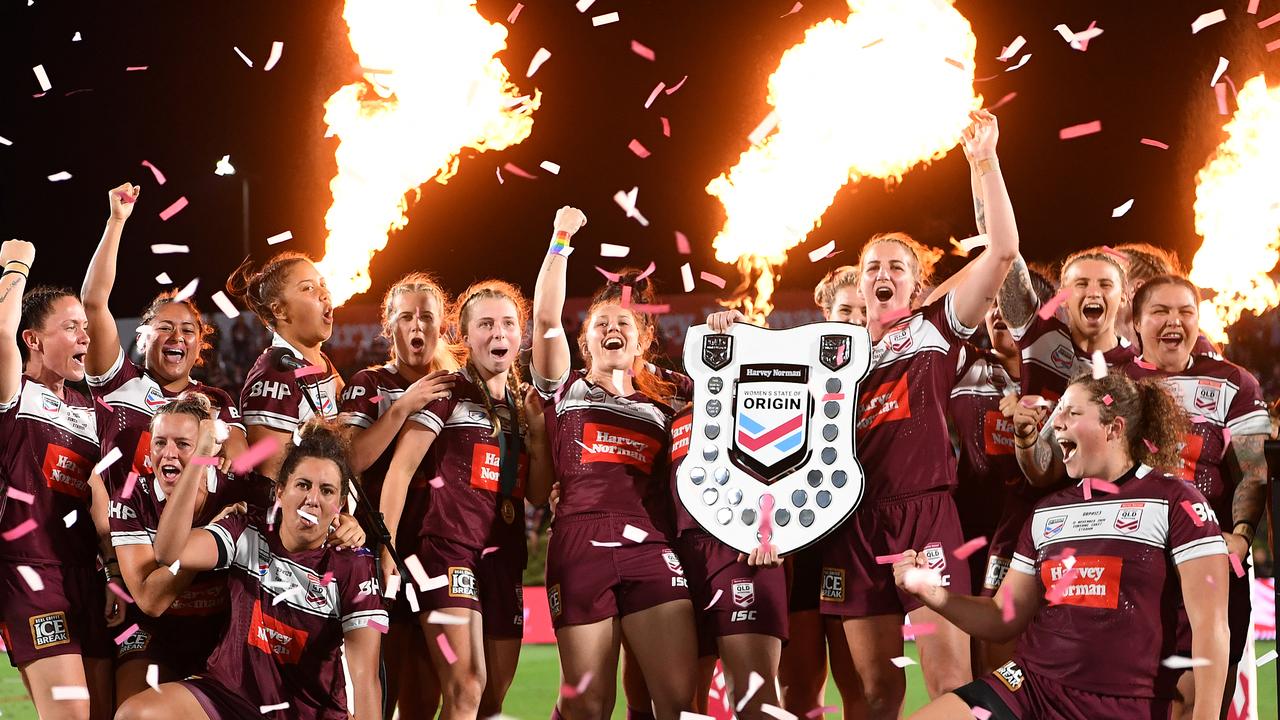 Queensland players celebrate their thrilling 8-6 win. Picture: Getty Images