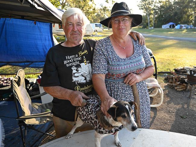 Tracey Hind, 58, and partner Stephen Ibbetson, 72, (with Charlie the dog, 19) are among the 40-odd homeless people at Pine Rivers Showgrounds. Picture: Lyndon Mechielsen