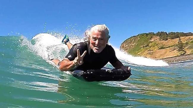 Mark Thomson with his hi-tech surf mat.