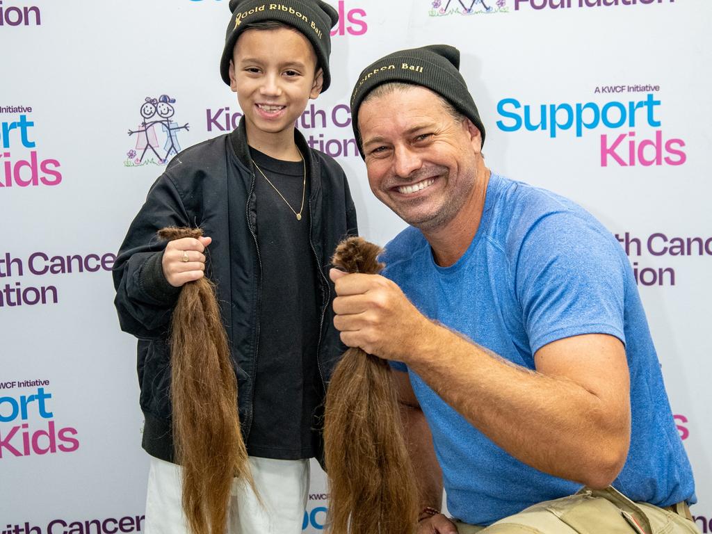 Nine-year-old Zai with farmer Dave Graham after his big chop. Photo: Contributed