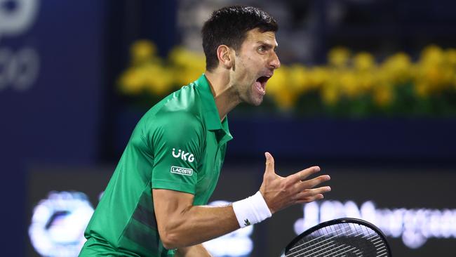 Novak Djokovic fires himself up during his win over Italy’s Lorenzo Musetti in Dubai