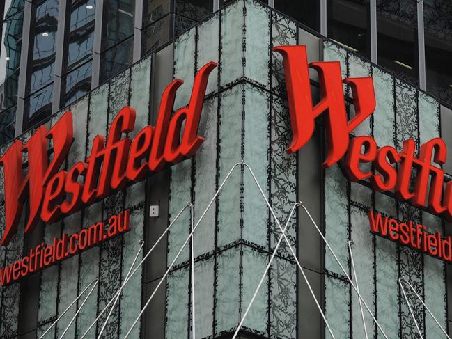 (FILES) This file photo taken on August 17, 2011 shows signage displayed on the Westfield Sydney Shopping Centre in central Sydney. French property giant Unibail-Rodamco  is to buy Australia's Westfield shopping mall operator, the two groups said on December 12, 2017, in what would be the biggest-ever corporate takeover in Australia. / AFP PHOTO / Greg Wood