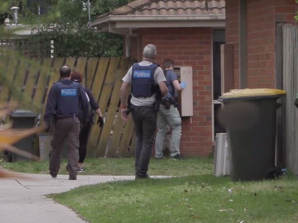 Police raid a home in Melbourne's south on Tuesday. Picture: Victoria Police