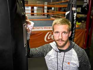 HANGING UP GLOVES: Toowoomba boxer Kris George has called time on his professional career. Picture: Nev Madsen