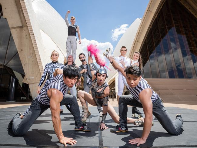 Pink-haired pole artist Polina Volchek (centre) with other performers from Cirque Stratosphere at the Sydney Opera House. Picture: Daniel Boud