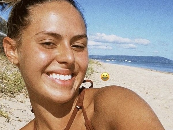 Mia Fevola rocks micro bikini on beach