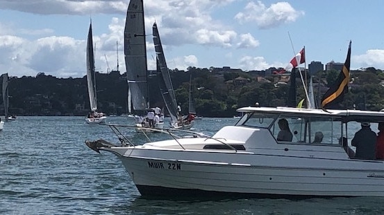 The Balmain start boat seeing off the fleet.