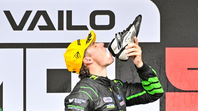 Tickford Racing’s Cam Waters does a shoey ter winning the Vailo Adelaide 500 Supercar Race. Picture: Brenton Edwards