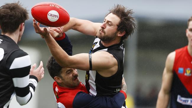 Round 6 TSL match between Glenorchy v North Hobart from KGV. Glenorchy's Zac Webster is tackled by North Hobart's Jeffrey Fisher. Picture: Zak Simmonds