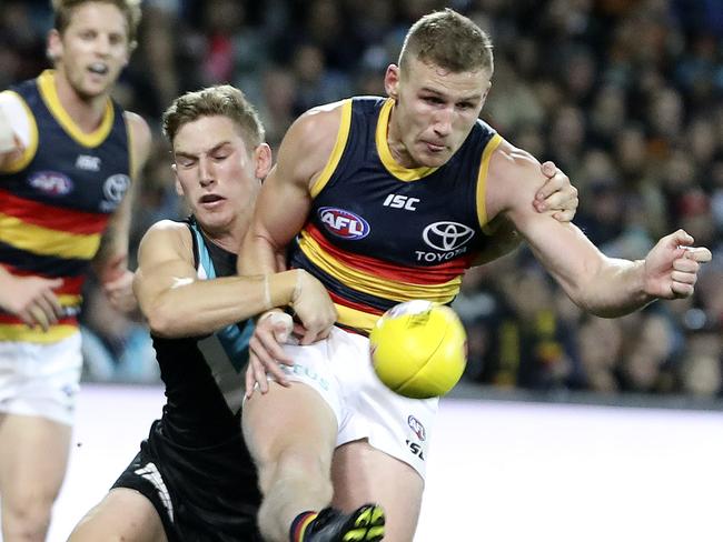 AFL - SHOWDOWN 46 - Port Adelaide v Adelaide Crows at Adelaide Oval. Rory Laird under pressure from Kane Farrell. Picture SARAH REED