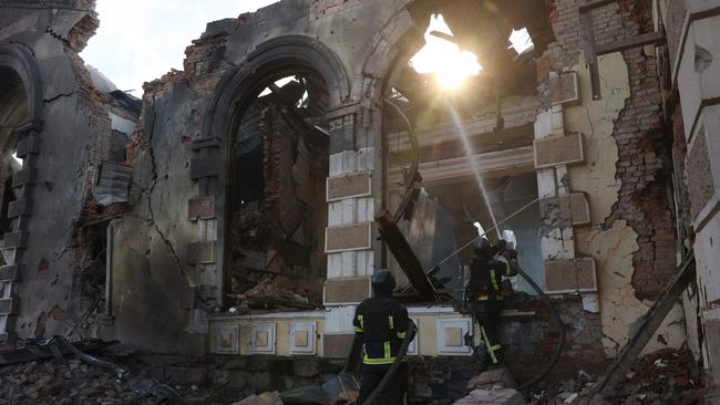 Firefighters extinguish a fire at the railway station destroyed by a Russian missile attack in Donetsk region. Picture: AFP