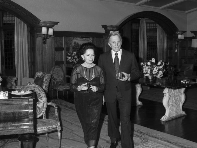 Lady Mary Fairfax and Kirk Douglas inside the home in 1980. Picture: Keith Byron