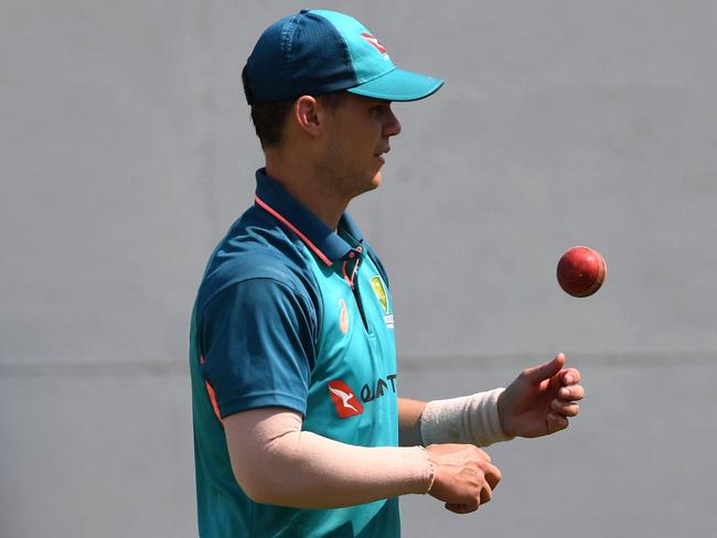 Australia's Mitchell Swepson prepares to bowl during a practice session at the Vidarbha Cricket Association (VCA) Stadium in Nagpur on February 7, 2023, ahead of the first Test cricket match between India and Australia. (Photo by INDRANIL MUKHERJEE / AFP) / ----IMAGE RESTRICTED TO EDITORIAL USE - STRICTLY NO COMMERCIAL USE-----