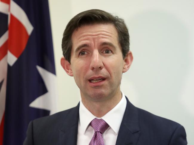 Minister for Education and Training Simon Birmingham speaks to the media after the Education council ministers meeting in Adelaide, Friday, April 13, 2018. (AAP Image/Kelly Barnes) NO ARCHIVING