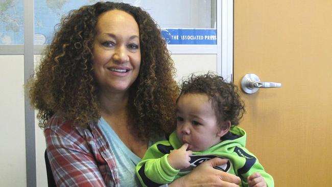 Rachel Dolezal, with her son, Langston, has legally changed her name to Nkechi Amare Diallo. She rose to prominence as a black civil rights leader, but then lost her job when it was revealed she was white.