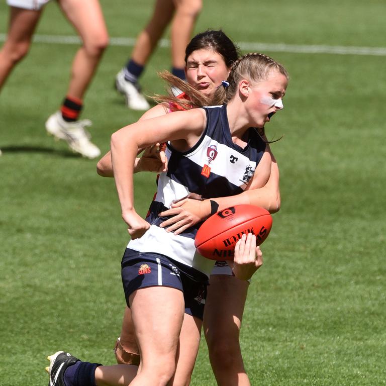 Junior under 15 Girls AFL Final between Broadbeach and Burleigh. Broadbeach's Kaedah Winch-Smith and Burleigh's Susanne Allen. (Photo/Steve Holland)