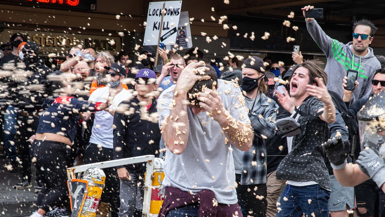 Police pepper spray protestors in the CBD. Picture: NCA NewsWire/Sarah Matray