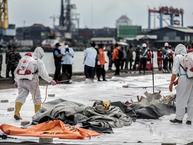 Health workers with body bags after Sriwijaya Air flight SJ182 crashed in Jakarta. Picture: AFP