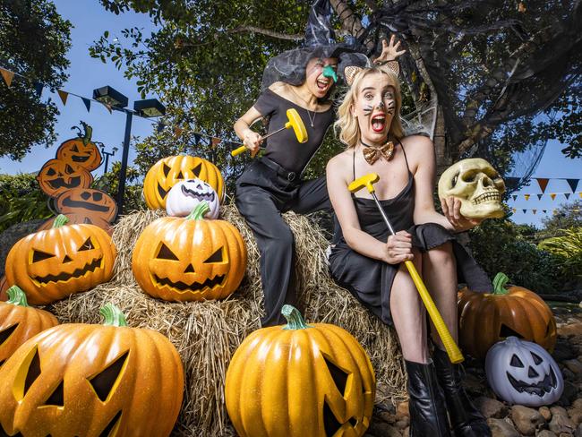 Alita Sokhara Says and Julia Crosswell get into the spirit at the Halloween-themed putt putt course at Victoria Park Golf Club. Picture: Lachie Millard