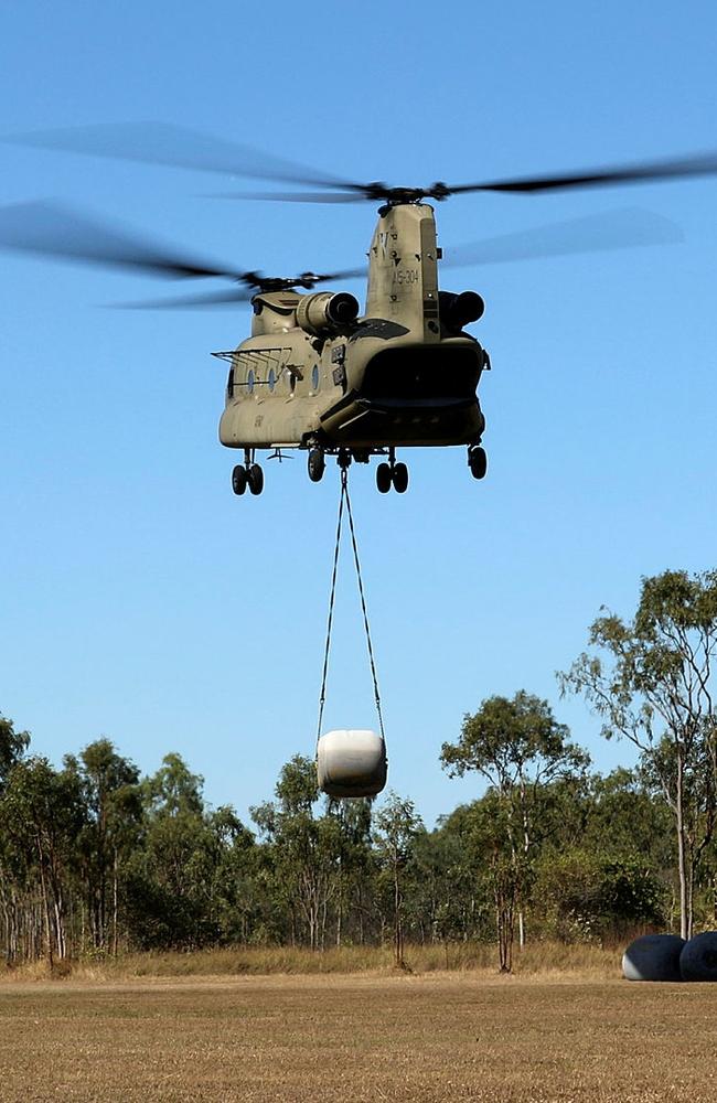 An Australian Army 5th Aviation Regiment CH-47F Chinook helicopter conducts external aviation transport training at Donnington Airpark, Townsville, Queensland. Within the training area rotary wing crews will practice landings and take-offs, operating in confined spaces and carrying exterior loads. Picture: CFN Luke Hollowood