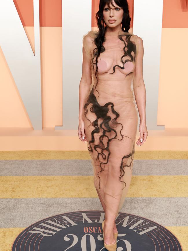 Ultra-long hair extensions snaked across the star's body. Picture: Amy Sussman/Getty Images