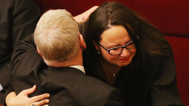 Gavin Jennings MP hugs Harriet Shing after a speech. Picture: Michael Dodge/Getty Images