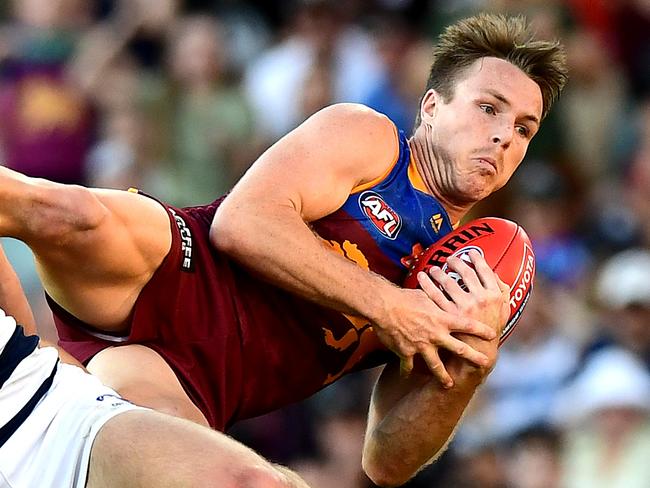 BRISBANE, AUSTRALIA - AUGUST 17: Lincoln McCarthy of the Lions takes a mark during the round 22 AFL match between the Brisbane Lions and the Geelong Cats at The Gabba on August 17, 2019 in Brisbane, Australia. (Photo by Bradley Kanaris/AFL Photos via Getty Images )