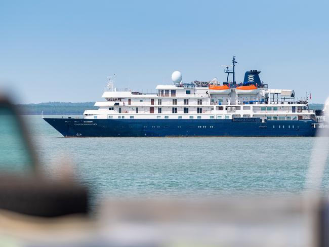 The luxury boutique cruise ship MS <i>Caledonian Sky</i> moored in Darwin Harbour ... a court hearing is expected to this week to hear an appeal against the direction to leave Australian territoryPicture: Che Chorley