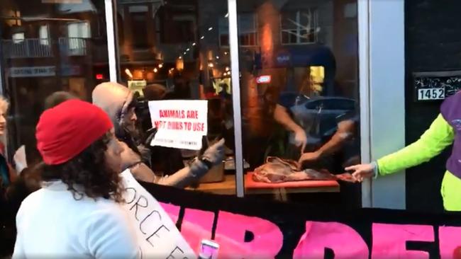 A chef’s response to angry vegans protesting outside his store has infuriated them.