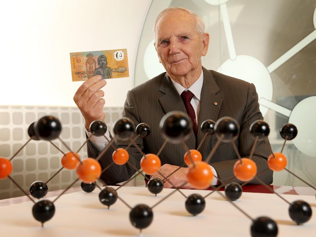 Polymer banknote inventor Professor David Solomon, holding one of the first plastic $10 banknotes, issued to commemorate Australia’s bicentenary, was awarded an AC in 2016 for services to science. Picture: Stuart McEvoy