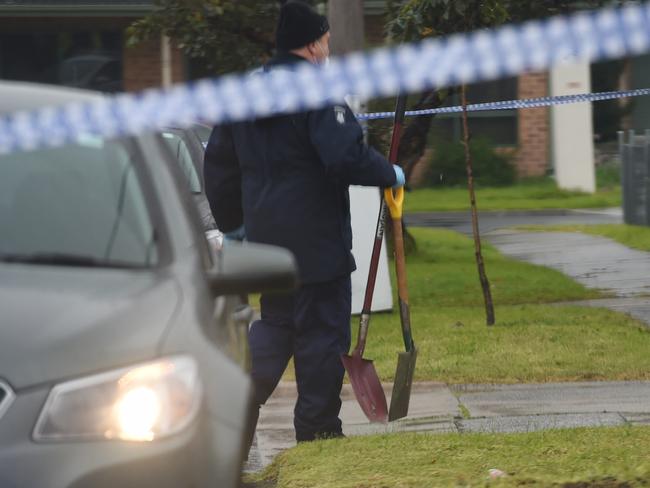 Homicide squad arrive at the Broadmeadows home with shovels.