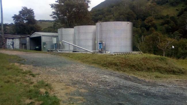 Tanks on site at the Consolidated Water Pty Ltd water extraction site at Natural Bridge.