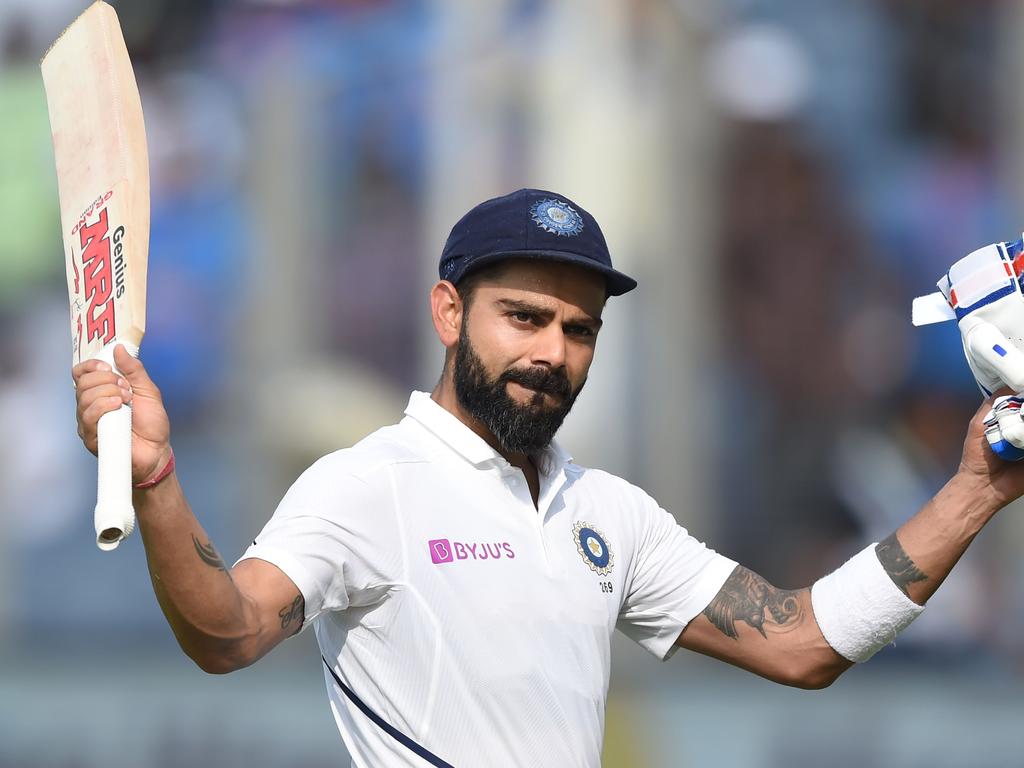 Kohli greets fans after his highest Test score of 254 not out in 2019 against South Africa. Picture: Punit Paranjpe / AFP