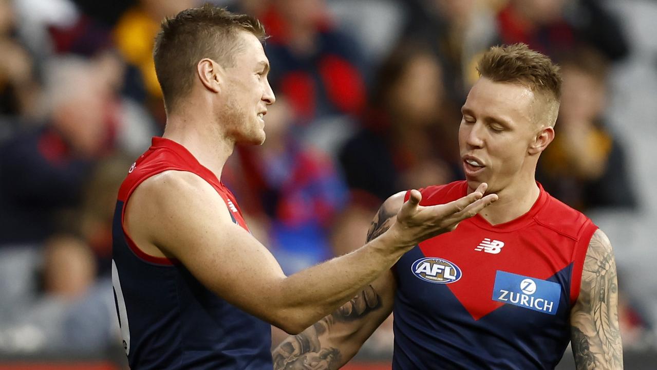 Tom McDonald explains his brain fade to James Harmes. Photo by Darrian Traynor/AFL Photos/Getty Images