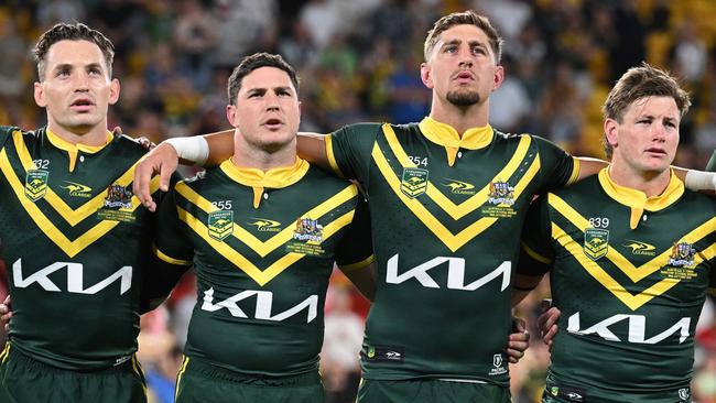 BRISBANE, AUSTRALIA - OCTOBER 18: The Australian players embrace during the men's 2024 Pacific Championships match between Australia Kangaroos and Tonga at Suncorp Stadium on October 18, 2024 in Brisbane, Australia. (Photo by Bradley Kanaris/Getty Images)