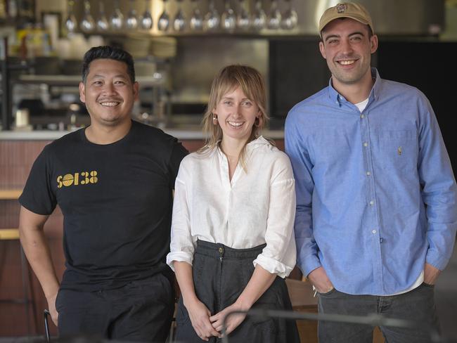 Dine by Donation.Hospo workers Kate Roberts (centre) and Joel Tisato (R) have created "SHARE" - a dine by donation concept that uses food salvaged through OzHarvest, which is cooked up at restaurants for people to enjoy a meal, and then pay what they can at the end. The first dinner is at Soi.38 on Sunday night.  with Soi.38 chef Terry Intarakhaharng  (L) Friday 28 August  2020 Pic Roy Van Der Vegt