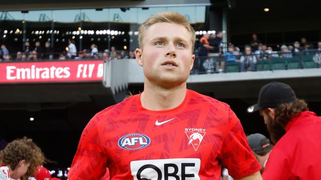 MELBOURNE, AUSTRALIA - MARCH 15: Braeden Campbell of the Swans warms up during the 2024 AFL Round 01 match between the Collingwood Magpies and the Sydney Swans at the Melbourne Cricket Ground on March 15, 2024 in Melbourne, Australia. (Photo by Dylan Burns/AFL Photos via Getty Images)