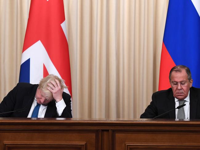 This is not going well. British Foreign Secretary Boris Johnson and Russian counterpart Sergei Lavrov during the press conference. Picture: Stefan Rousseau/Getty Images